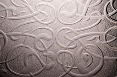 Textured glass detail with swirling pattern